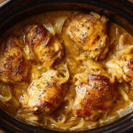 Slow cooker smothered chicken with onion gravy Southern style